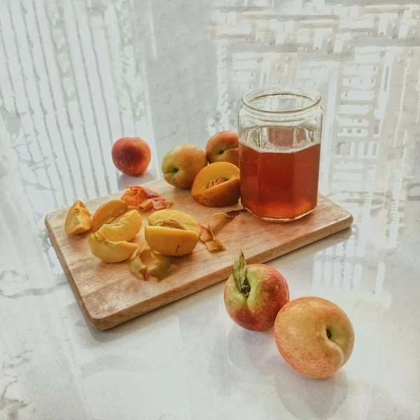 Fruit flavoured tea in a glass mug